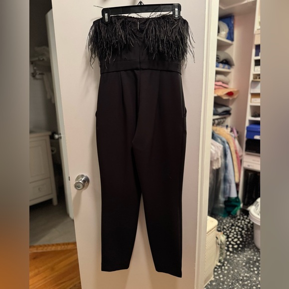 SAYLOR Black Jumpsuit with Feather Accent - Picture 2 of 5